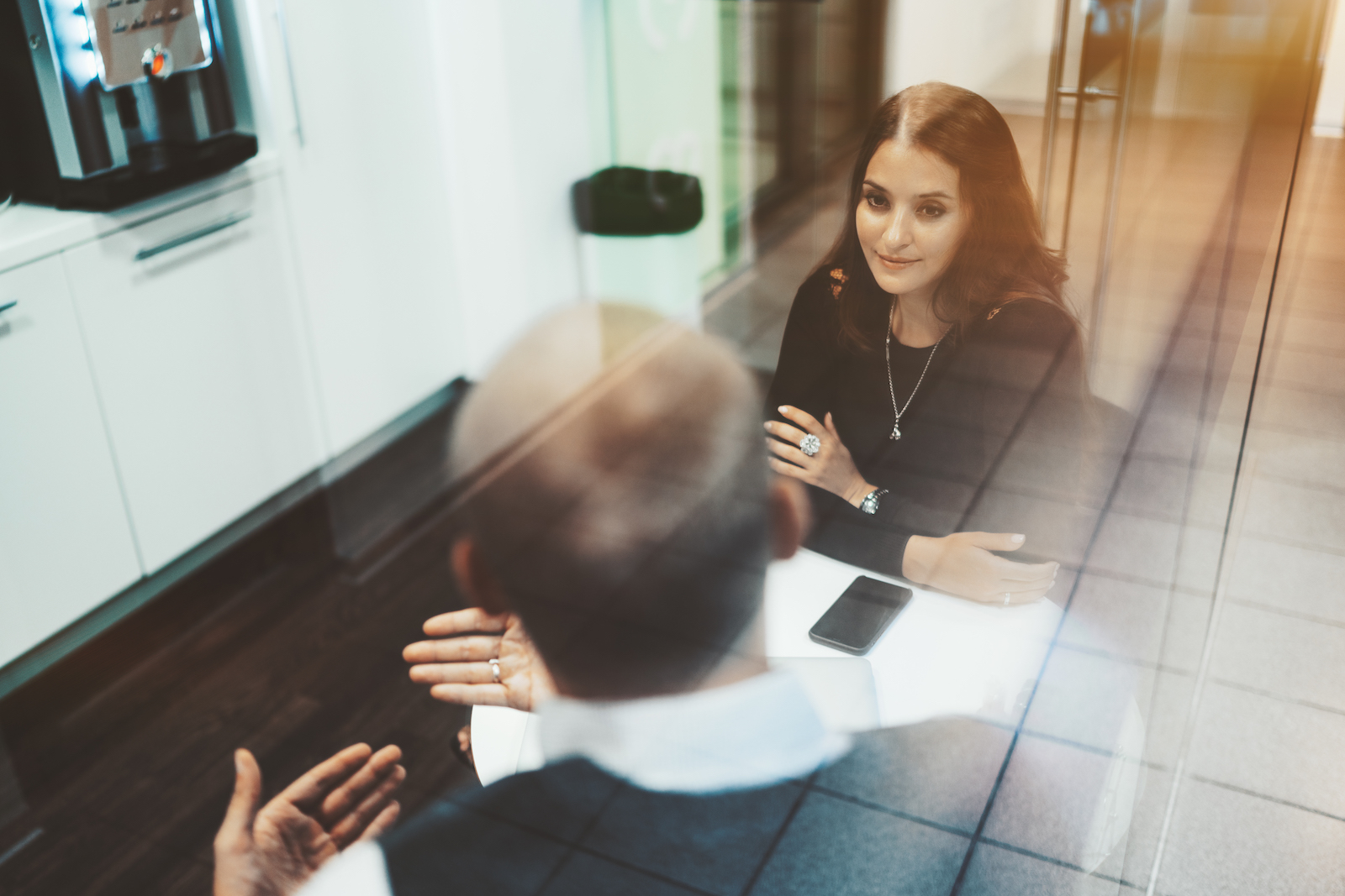 A Business talk in an office kitchen