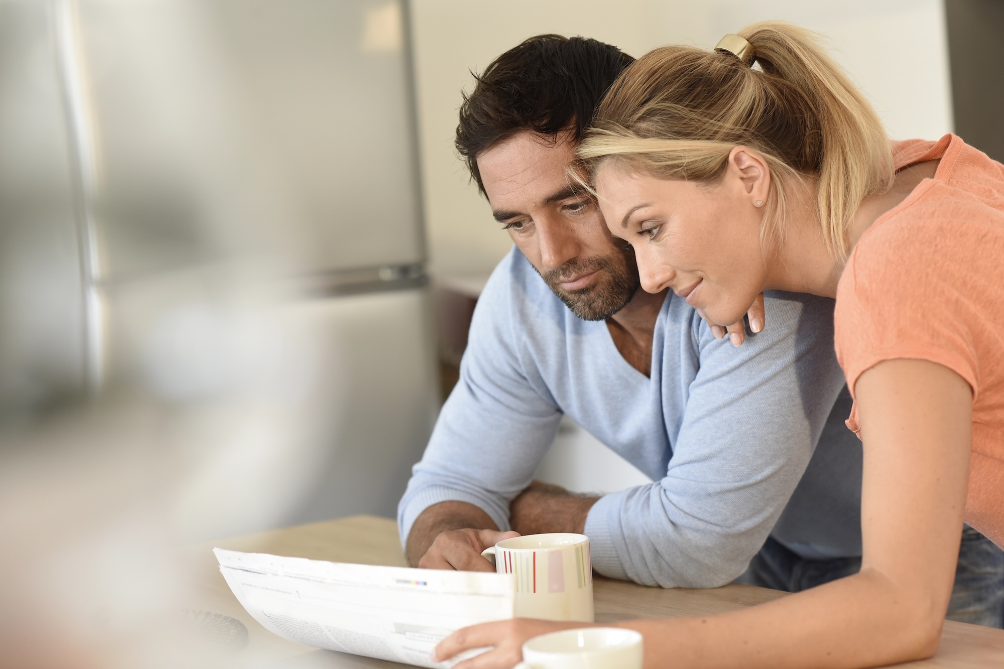 Middle-aged couple relaxing at home
